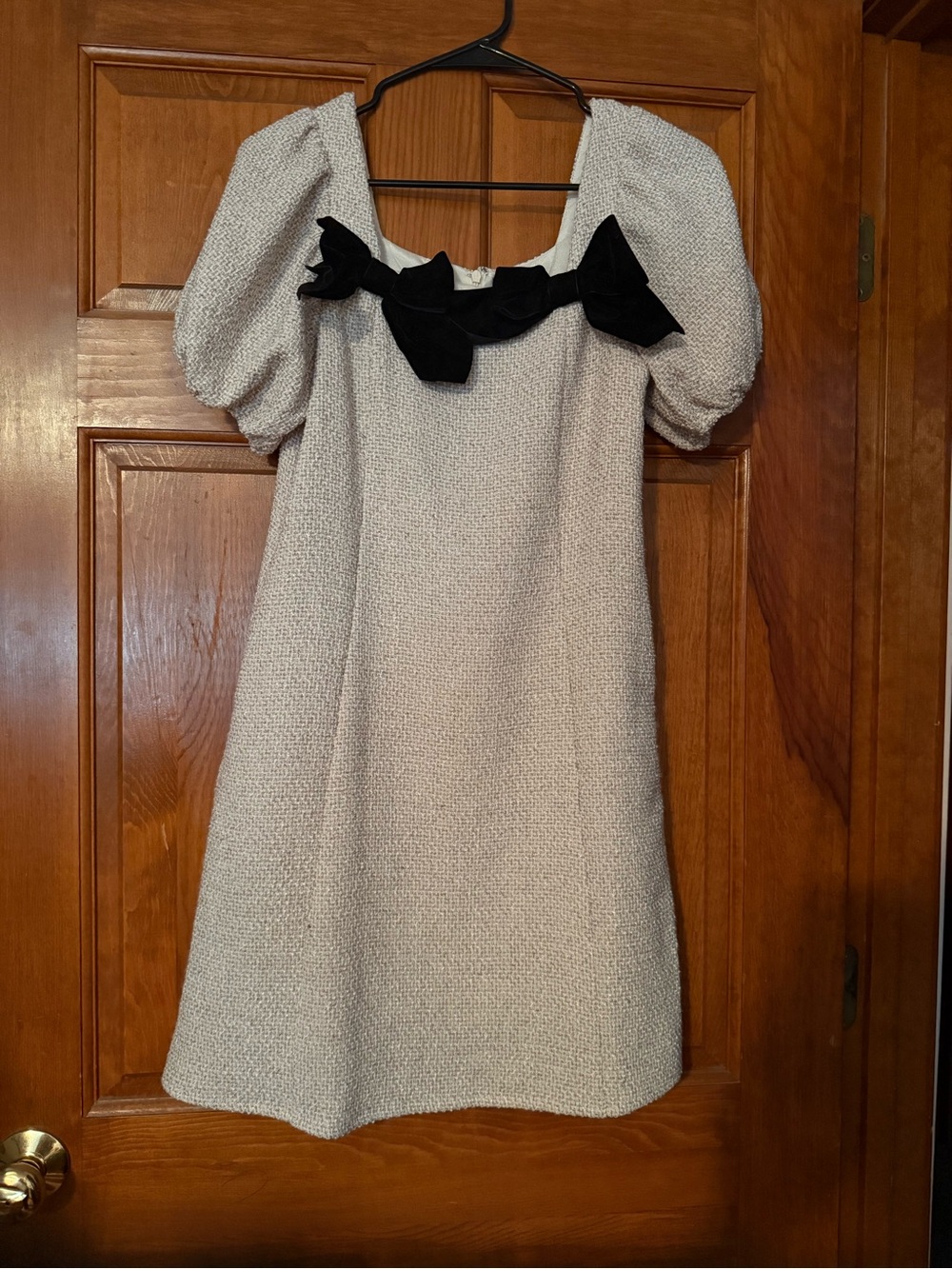 Textured Cream A-Line Dress with Black Bow Accent
